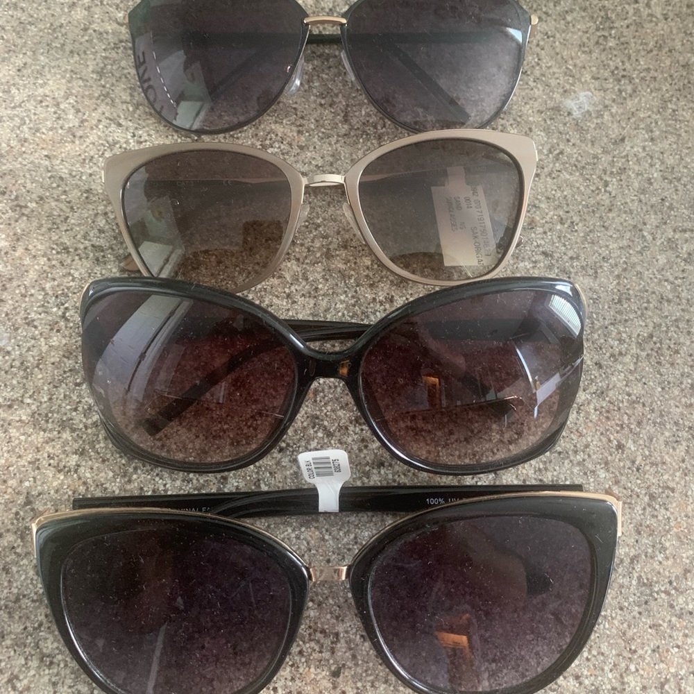 Women’s sunglasses set of 4 unworn in great condition